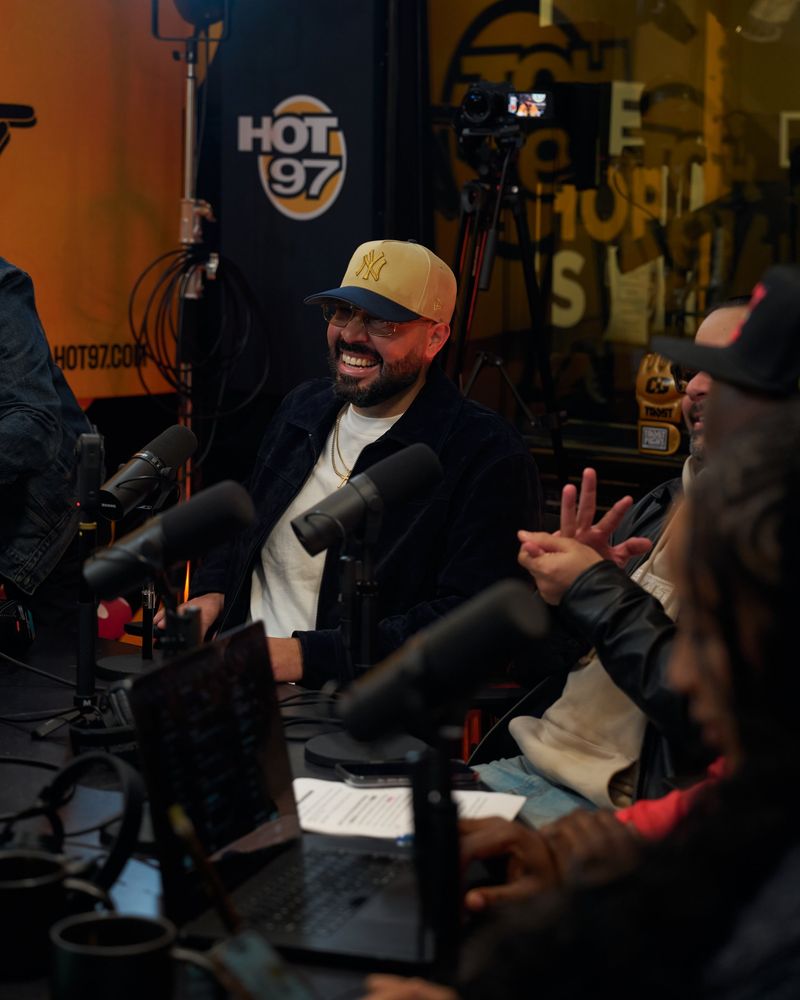 DJ Mode laughing in the Hot 97 studio