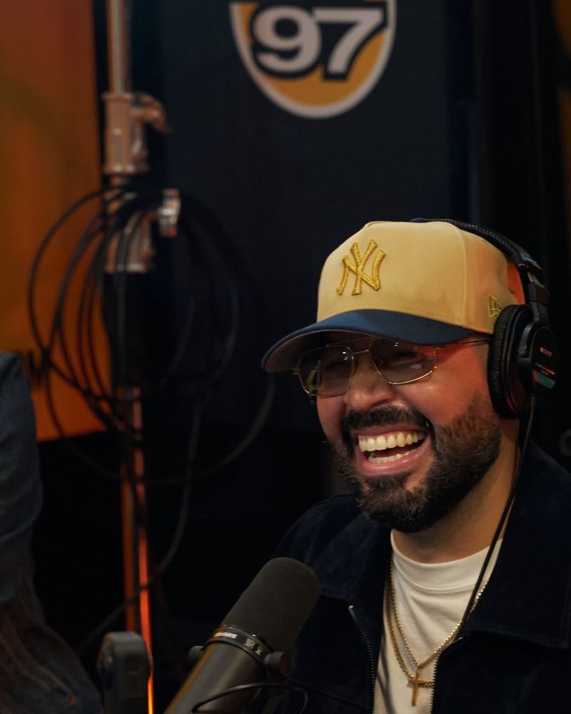 DJ Mode laughing in the Hot 97 studio